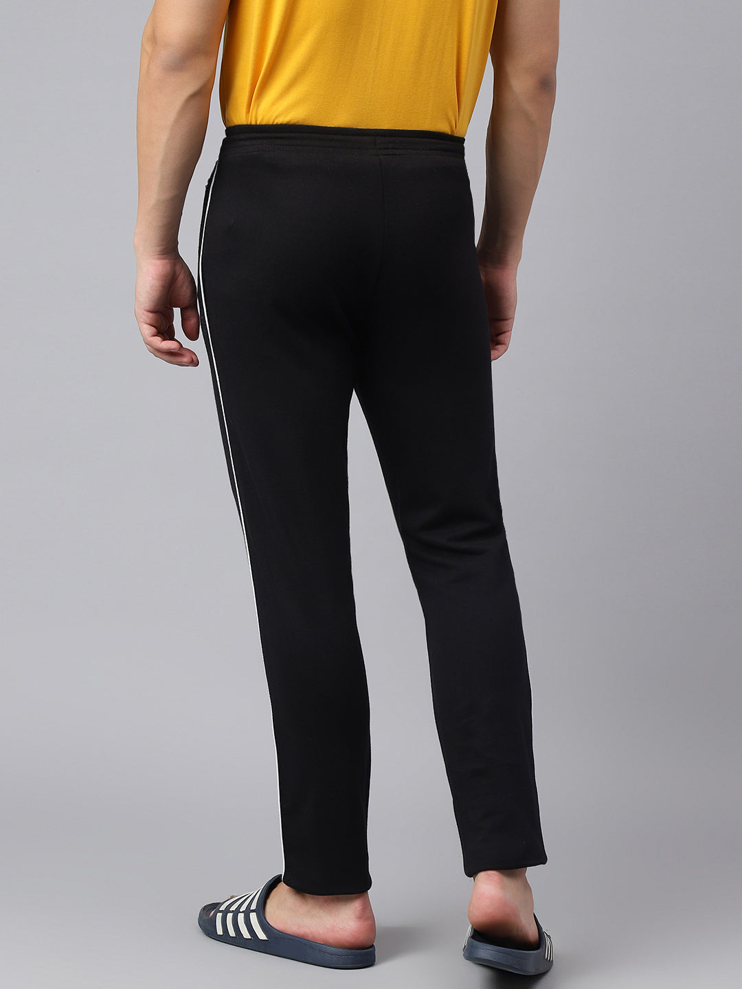 Men Black Slim Fit Mid Rise Solid Lower