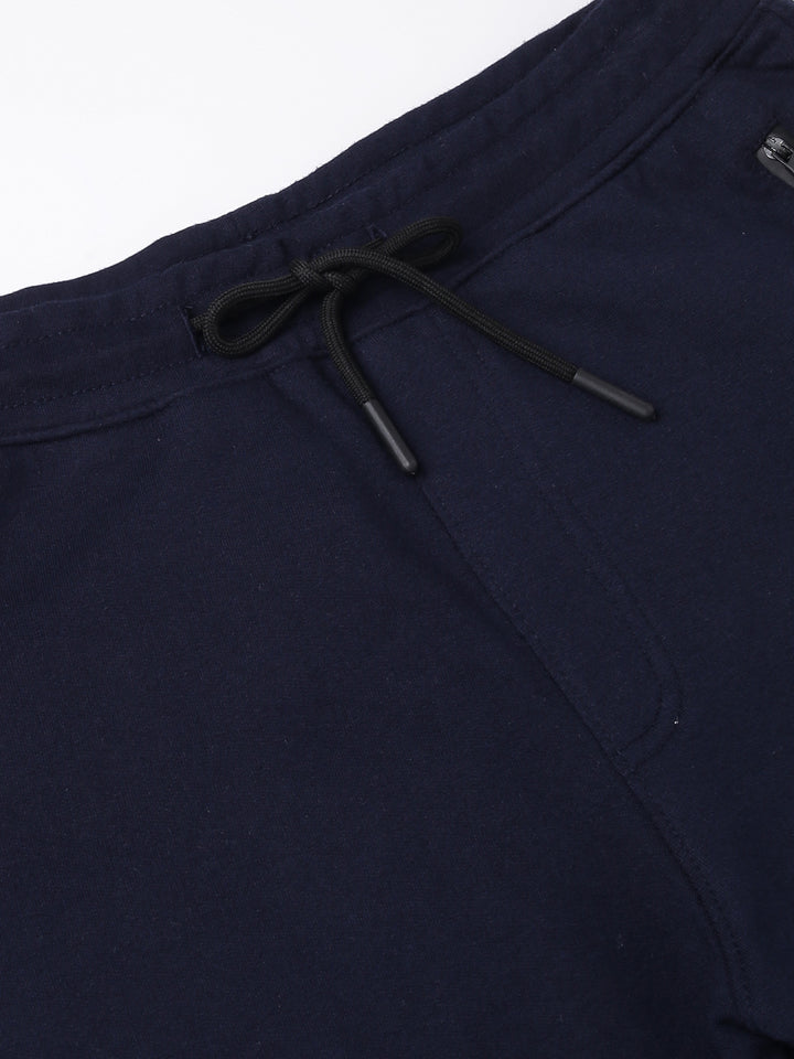 Men Navy Blue Slim Fit Mid Rise Solid Lower