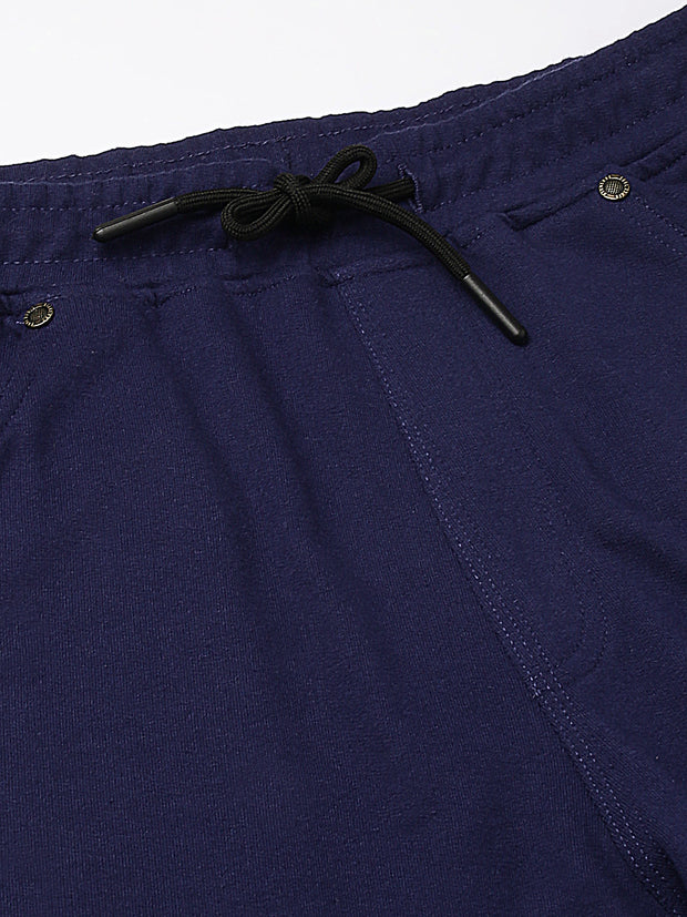 Men Blue Slim Fit Mid Rise Solid Lower