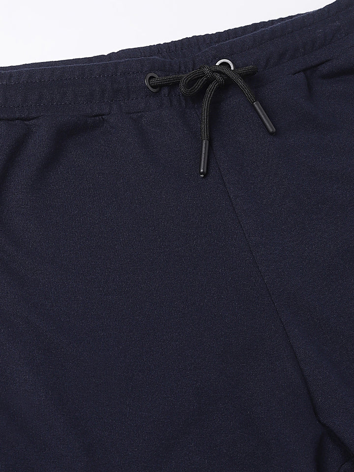 Men Navy Blue Slim Fit Mid Rise Solid Lower