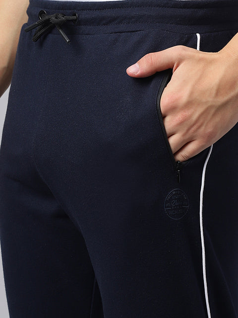 Men Navy Blue Slim Fit Mid Rise Solid Lower