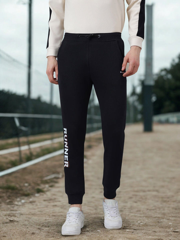 Men Black Slim Fit Mid Rise Jogger