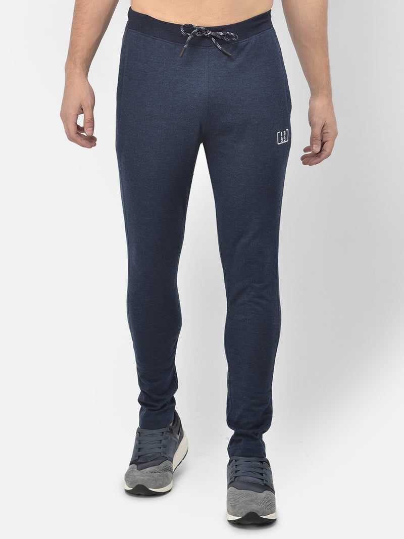 Men Blue Slim Fit Mid Rise Solid Lower